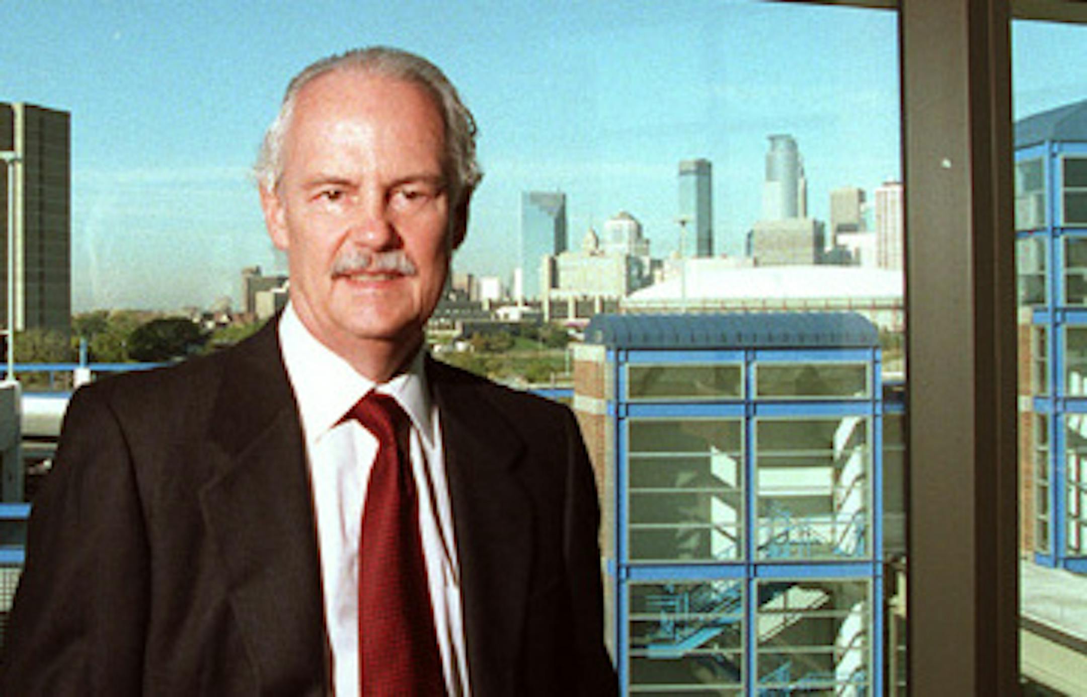 David Kidwell, dean of the Carlson School of Management -- Dean David Kidwell in the boardroom of the new building with Cedar Riverside and the Minneapolis skyline in the background. ORG XMIT: MER17ee26adb43e782f1c8de994707d8