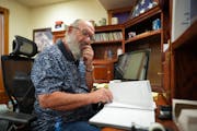 Ted Matthews, the Minnesota Department of Agriculture’s director of rural mental health, checked his schedule at his office in Hutchinson, Minn.