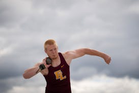 Forest Lake's Howie Johnson finishes third at the state meet in the shot put on June 6.