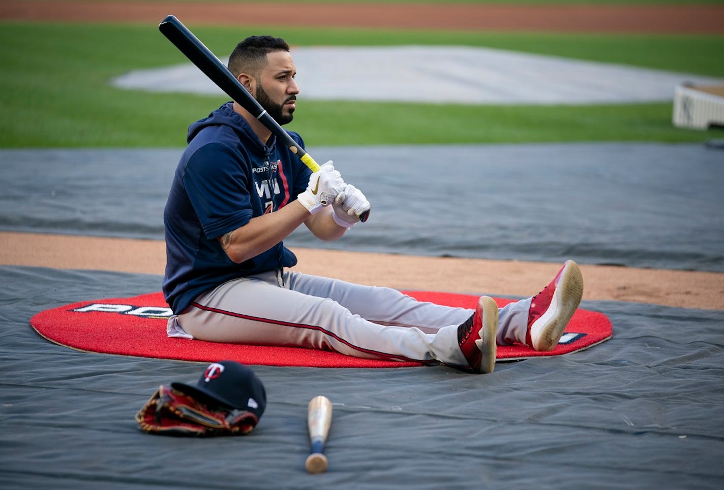 Minnesota Twins left fielder Marwin Gonzalez swung a bat while on the ground after stretching before taking batting practice.   ]  JEFF WHEELER • jeff.wheeler@startribune.com