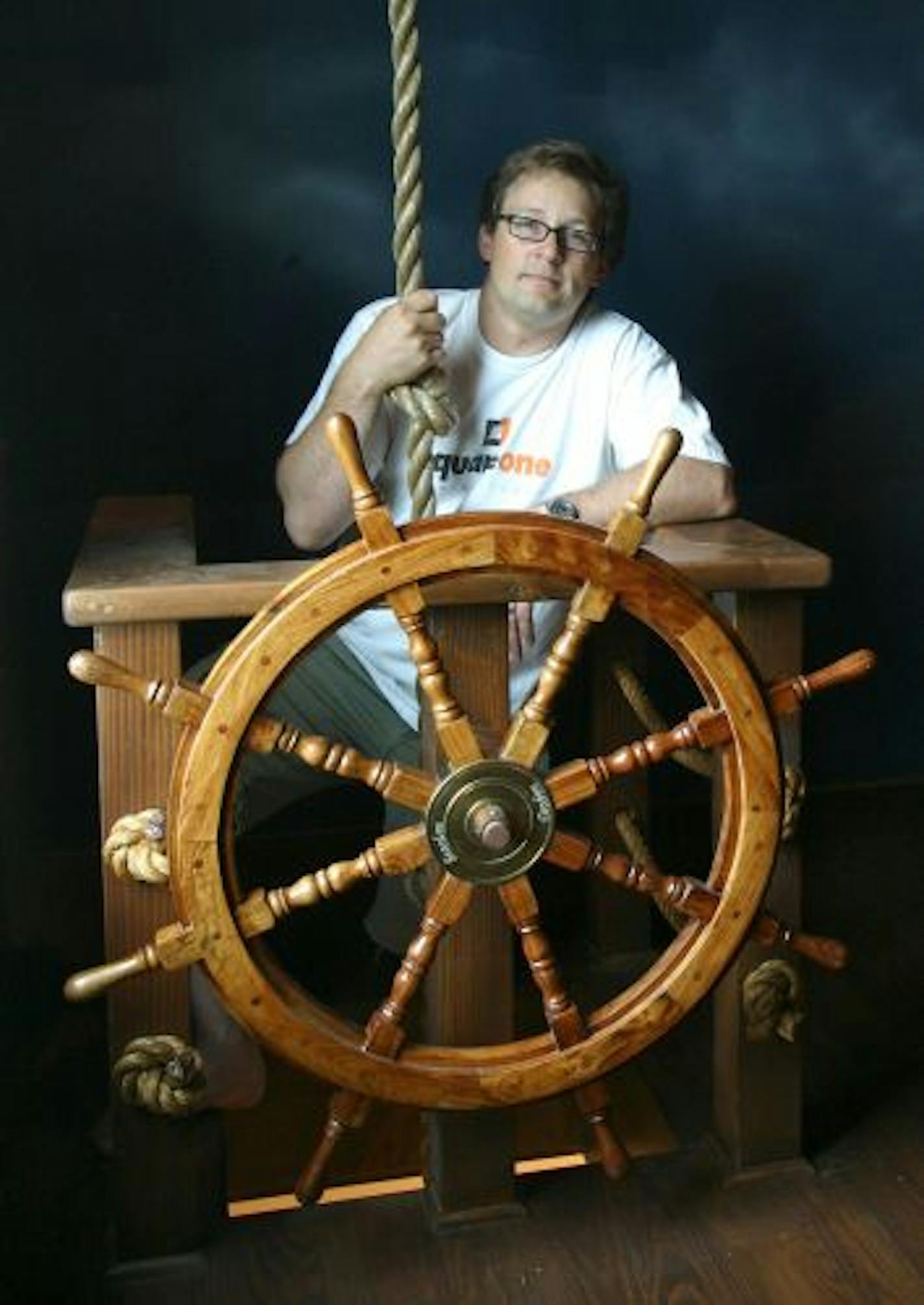 Steve Kuhl sits at the helm of the ship. The rope descends into the closet below for quick wardrobe changes.