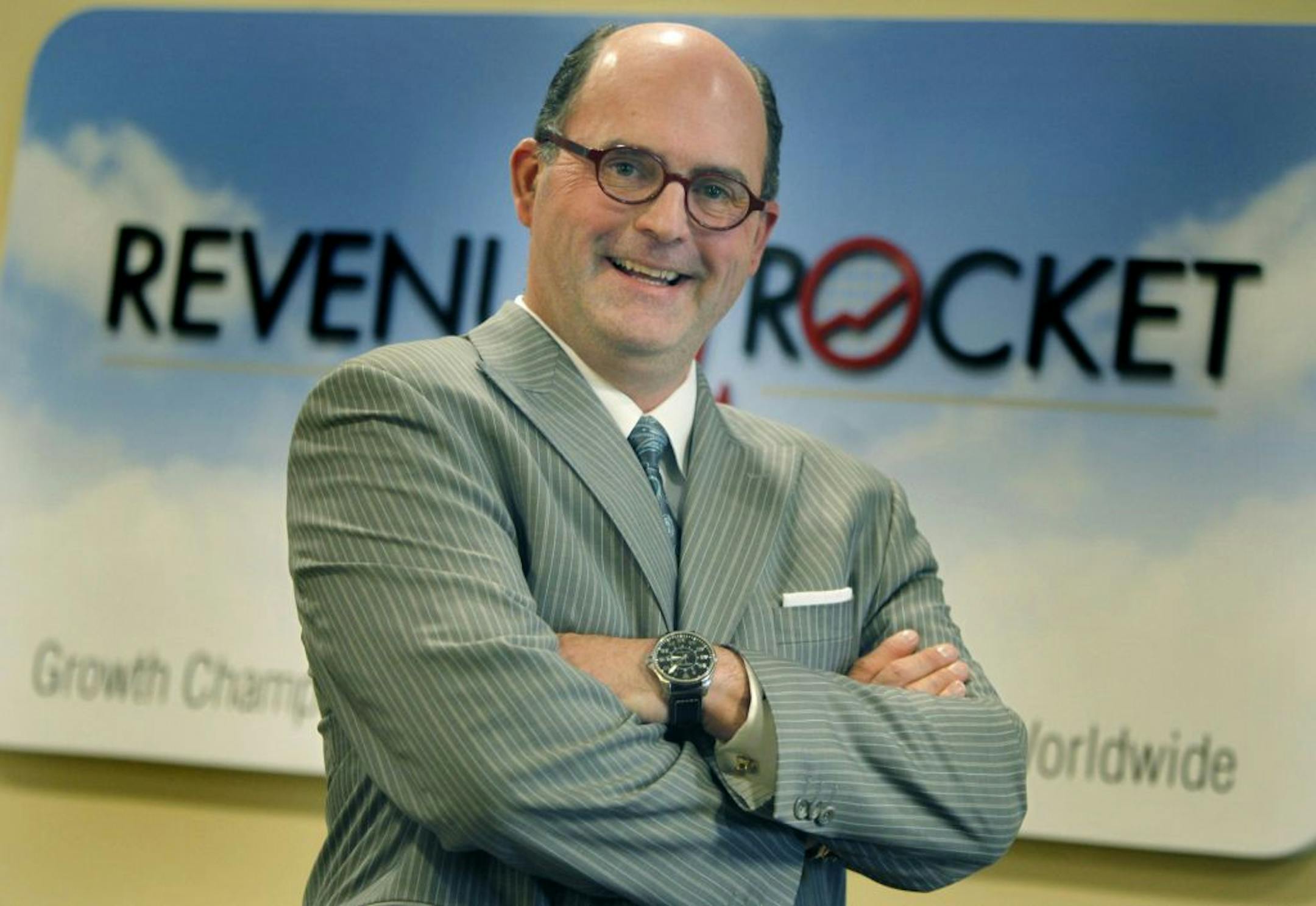 Mike Harvath first came in contact with the "drug" of rapid growth at a fast-rising tech distribution company in the '80s. Now, after going on to start, acquire and sell a number of companies, he tries to help other entrepreneurs experience the exhilaration of expansion as the head of Revenue Rocket Consulting Group. (ELIZABETH FLORES/STAR TRIBUNE) ELIZABETH FLORES � eflores@startribune.com