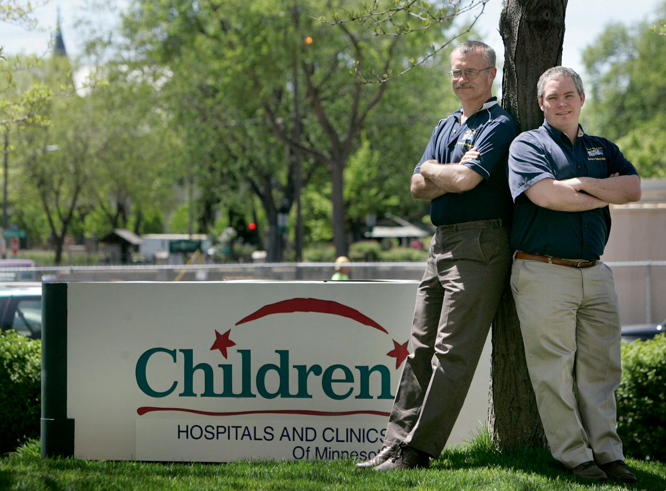 Festival Director Dave LaPorte, left, tapped Paul Merwin as a director for the Nature Valley Grand Prix races, part of this month's Great River Energy Bicycle Festival. Money raised in the Great River Energy races goes to Children's Hospital of Minneapolis.