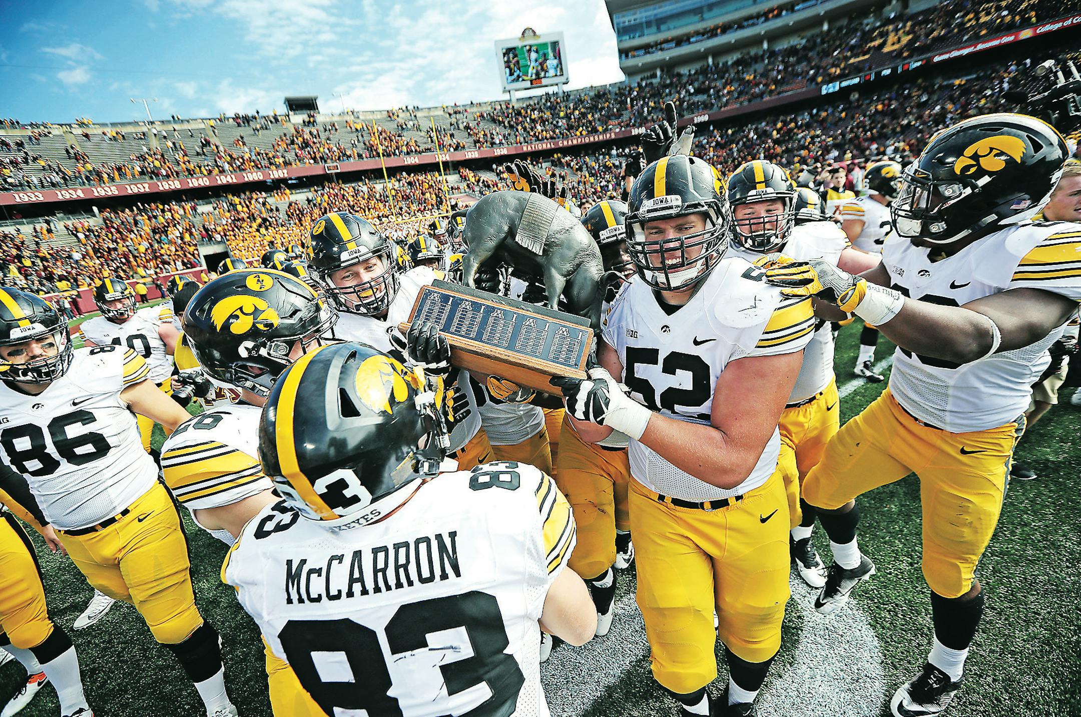 The Iowa Hawkeyes players celebrated a 14-7 win over Minnesota as they paraded on the field with the Floyd of Rosedale trophy at TCF Bank Stadium, Saturday, October 8, 2016 in Minneapolis, MN. ] (ELIZABETH FLORES/STAR TRIBUNE) ELIZABETH FLORES • eflores@startribune.com
