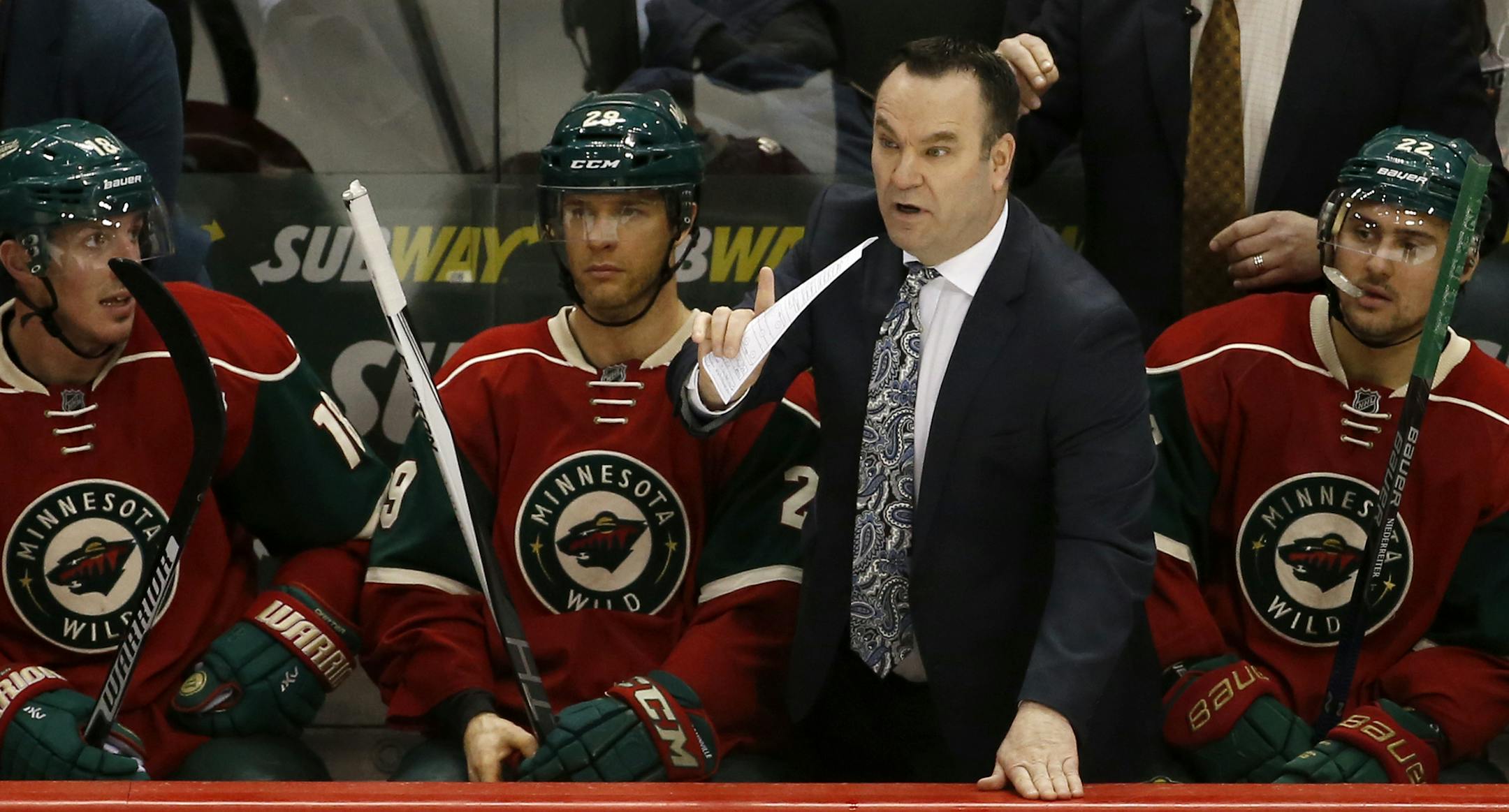 Minnesota Wild head coach John Torchetti calls out to a referee during the third period of an NHL hockey game in St. Paul, Minn., Sunday, Feb. 28, 2016. The Wild won 3-1. (AP Photo/Ann Heisenfelt) ORG XMIT: OTKAH115