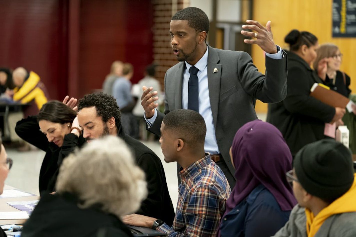 St. Paul Mayor Melvin Carter chatted with community members in "Summit workshops" after he gave the State of the City address at Harding High School in St. Paul, Minn., on Thursday, March 14, 2019. The workshops were meant to be conversations about making St. Paul more welcoming, safe and inclusive.