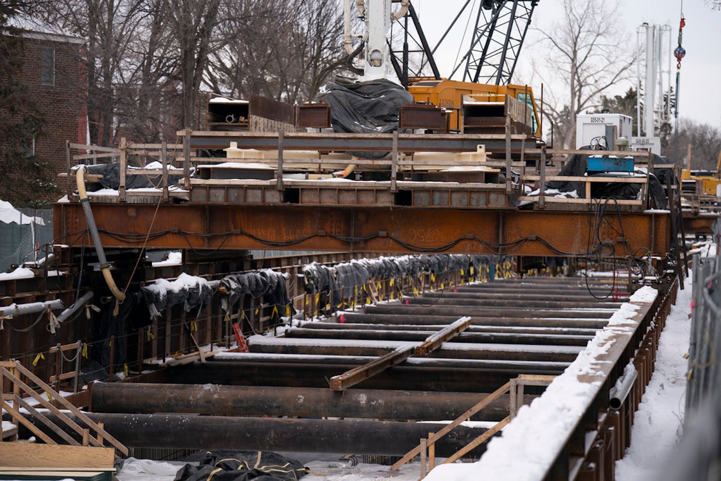 Construction equipment at the site of the tunnel in the Kenilworth corridor Wednesday afternoon, January 26, 2022 at in Minneapolis. Construction continued on the Kenilworth corridor section of the SWLRT project. The current $2.2 billion price tag of the Southwest light-rail line, the biggest public works project in state history, was expected to surge with an announcement by the Metropolitan Council Wednesday. ] JEFF WHEELER • Jeff.Wheeler@startribune.com