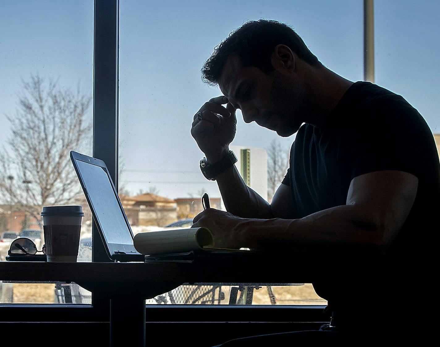 Former firefighter, Brian Cristofono, spent time doing homework at a coffee shop, Thursday, March 29, 2018 in Plymouth, MN. After leaving the fire department with a PTSD diagnosis, Cristofono now speaks to different fire departments about the mental risks of the job and is now retired and working to get a degree in nursing. ] ELIZABETH FLORES &#xef; liz.flores@startribune.com