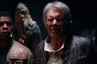 Harrison Ford, along with John Boyega and Peter Mayhew, are shown in a deleted scene from "Star Wars: The Force Awakens."