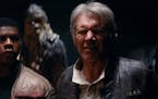 Harrison Ford, along with John Boyega and Peter Mayhew, are shown in a deleted scene from "Star Wars: The Force Awakens."