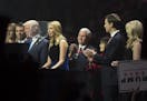 FILE &#x2014; Ivanka Trump delivers remarks at a campaign rally with her family and father, President-elect Donald Trump, and Mike and Karen Pence in 