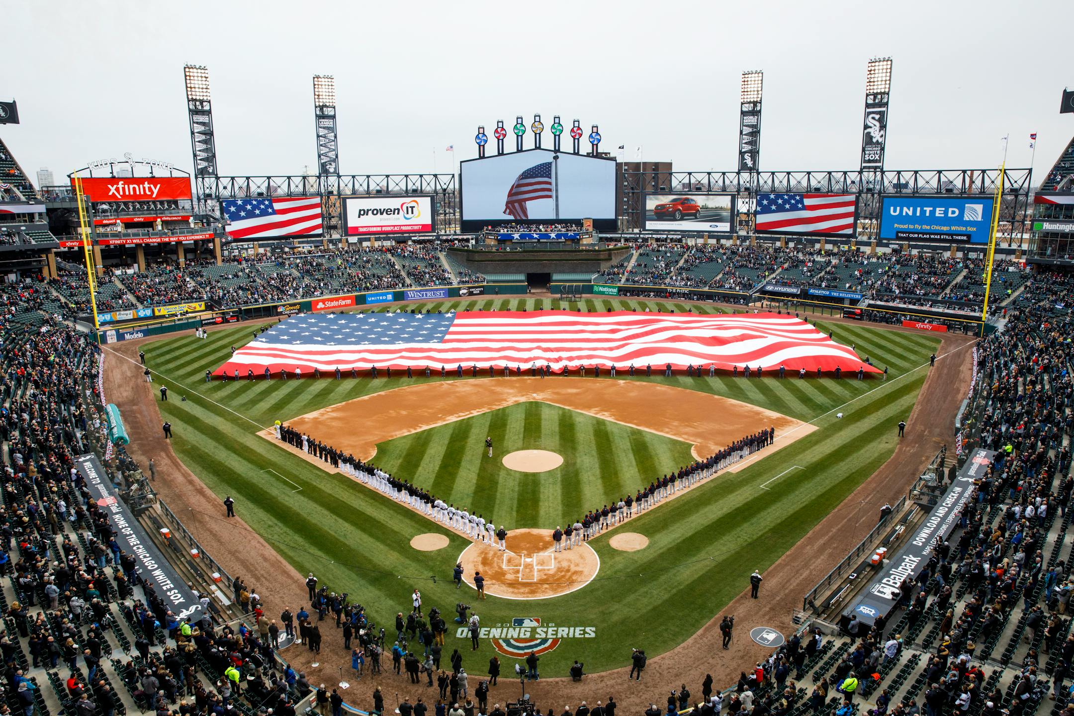 Players stand during the national anthem for the Chicago White Sox home opener against the Detroit Tigers at Guaranteed Rate Field in Chicago Thursday, April, 5 2018. (Armando L. Sanchez/Chicago Tribune/TNS) ORG XMIT: 1227885