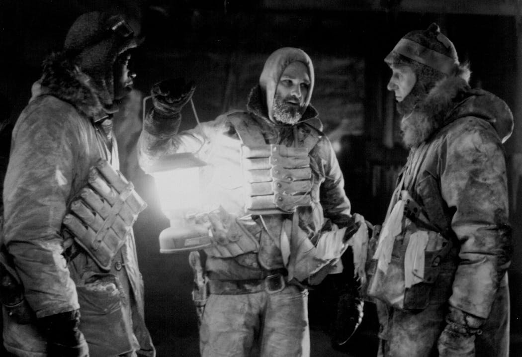Nauls (T.K.Carter), MacReady (Kurt Russell) and Garry (Donald Moffat) make plans for a final confrontation with “The Thing.”