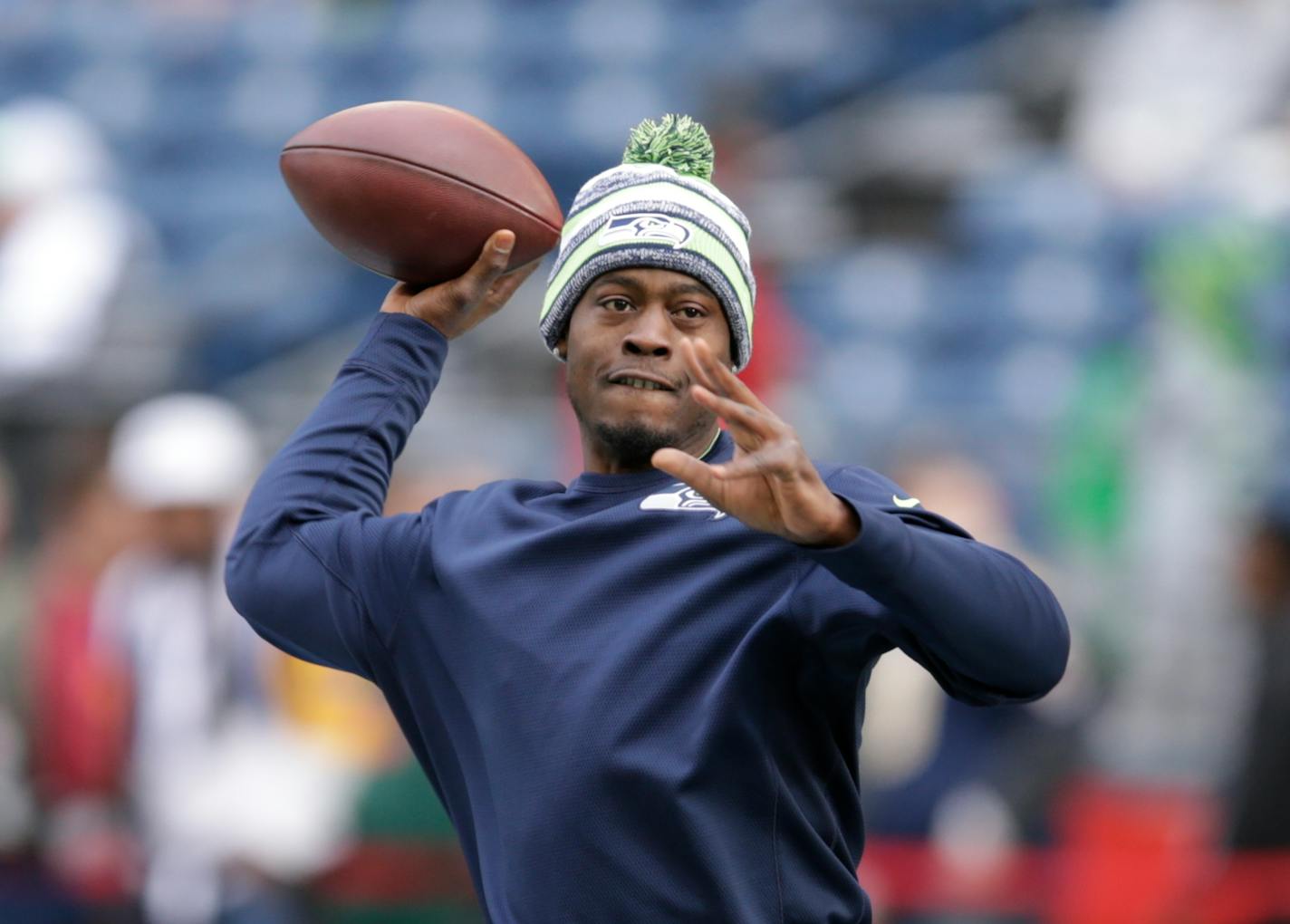 Seattle Seahawks backup quarterback Tarvaris Jackson passes during warmups before an NFL football game against the St. Louis Rams, Sunday, Dec. 28, 2014, in Seattle. (AP Photo/Scott Eklund)