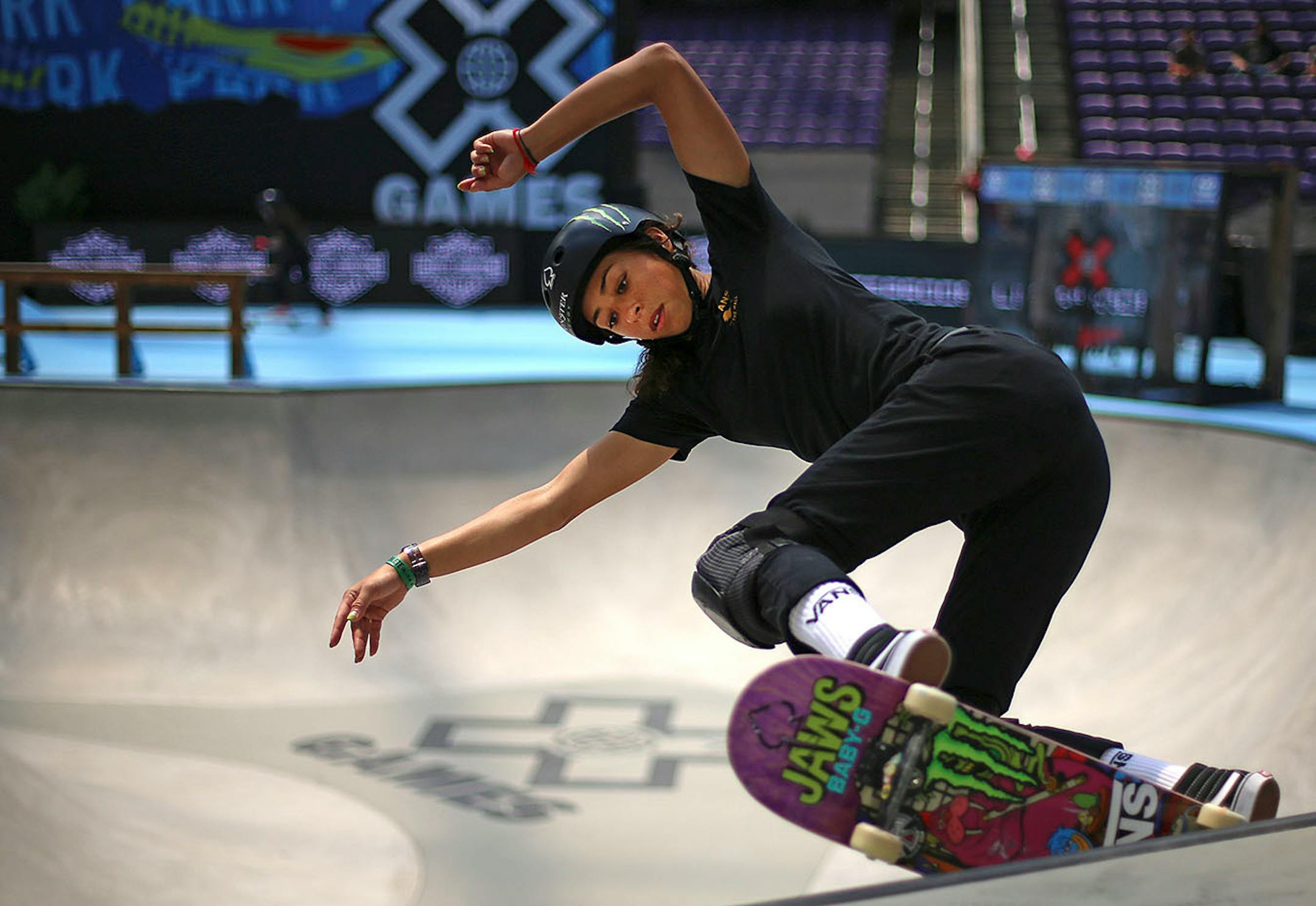 Lizzie Armanto pulls off a trick on the wall of the women's skateboard park final.