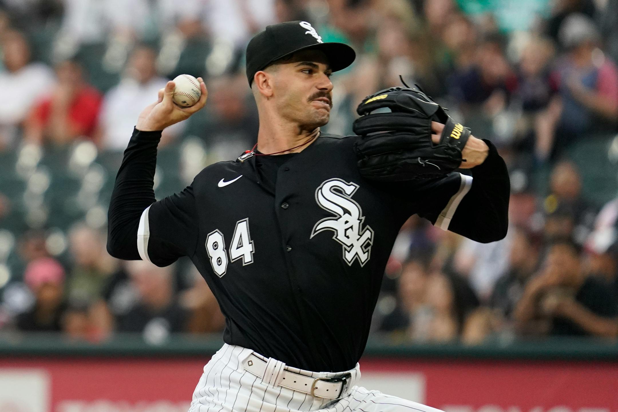 Chicago White Sox starting pitcher Dylan Cease throws against the Twins during the first inning Saturday