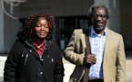 Augsburg Professor Mzenga Wanyama and his wife, Mary, waited outside the Immigration and Customs Enforcement headquarters for their meeting Thursday t