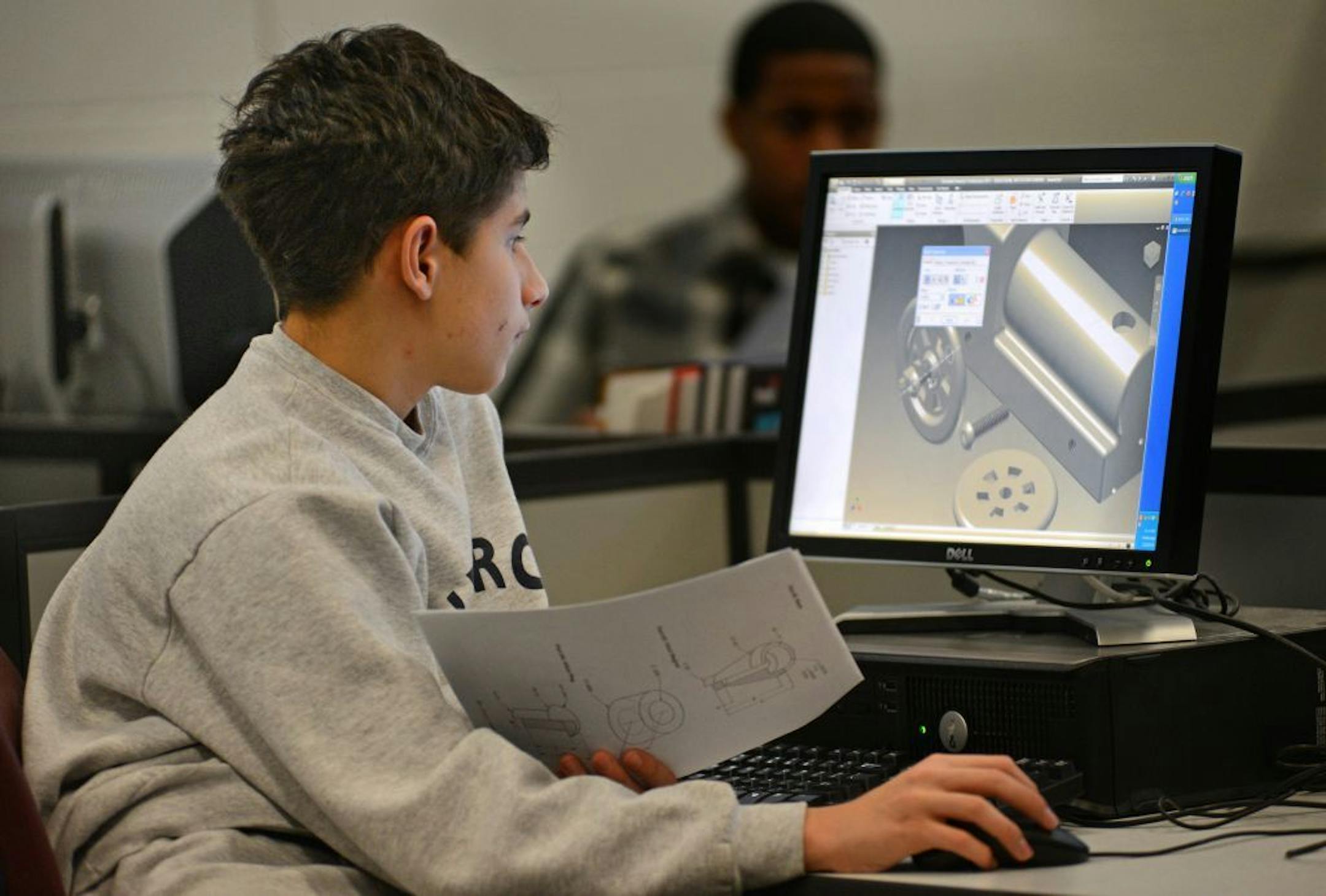 Johnson Aerospace & Engineering High School in St Paul has opened up a number of new labs in engineering and Aerospace labs. Andreas Kocher a ninth grader at Johnson Aerospace & Engineering High School worked on attaching a virtual train wheel at a Fab Lab on Wednesday, January 22 2014.