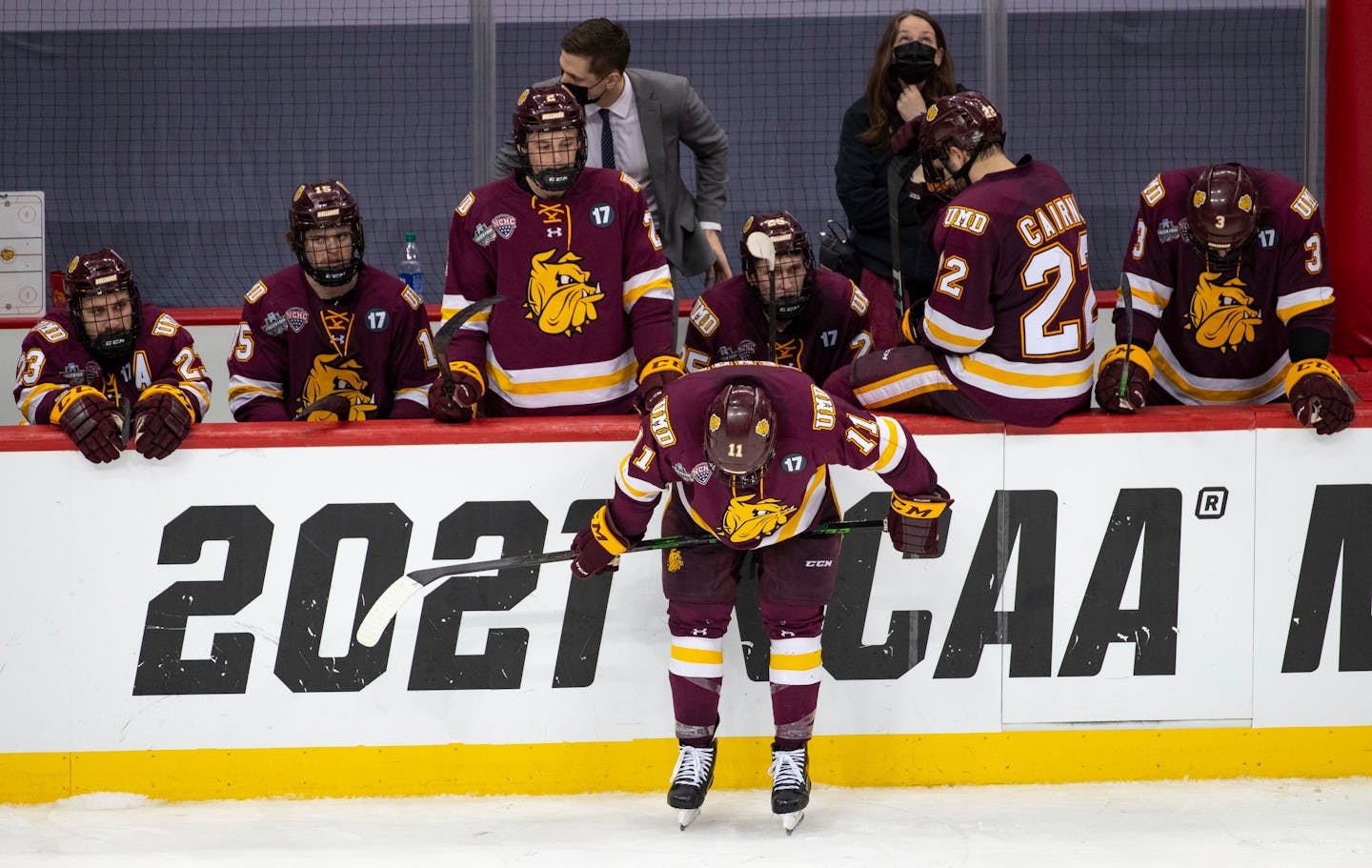 UMD players reacted to losing to University of Massachusetts 3-2 in overtime early Friday morning. The Bulldogs had their hopes of an NCAA record fourth straight national championship appearance dashed. ]