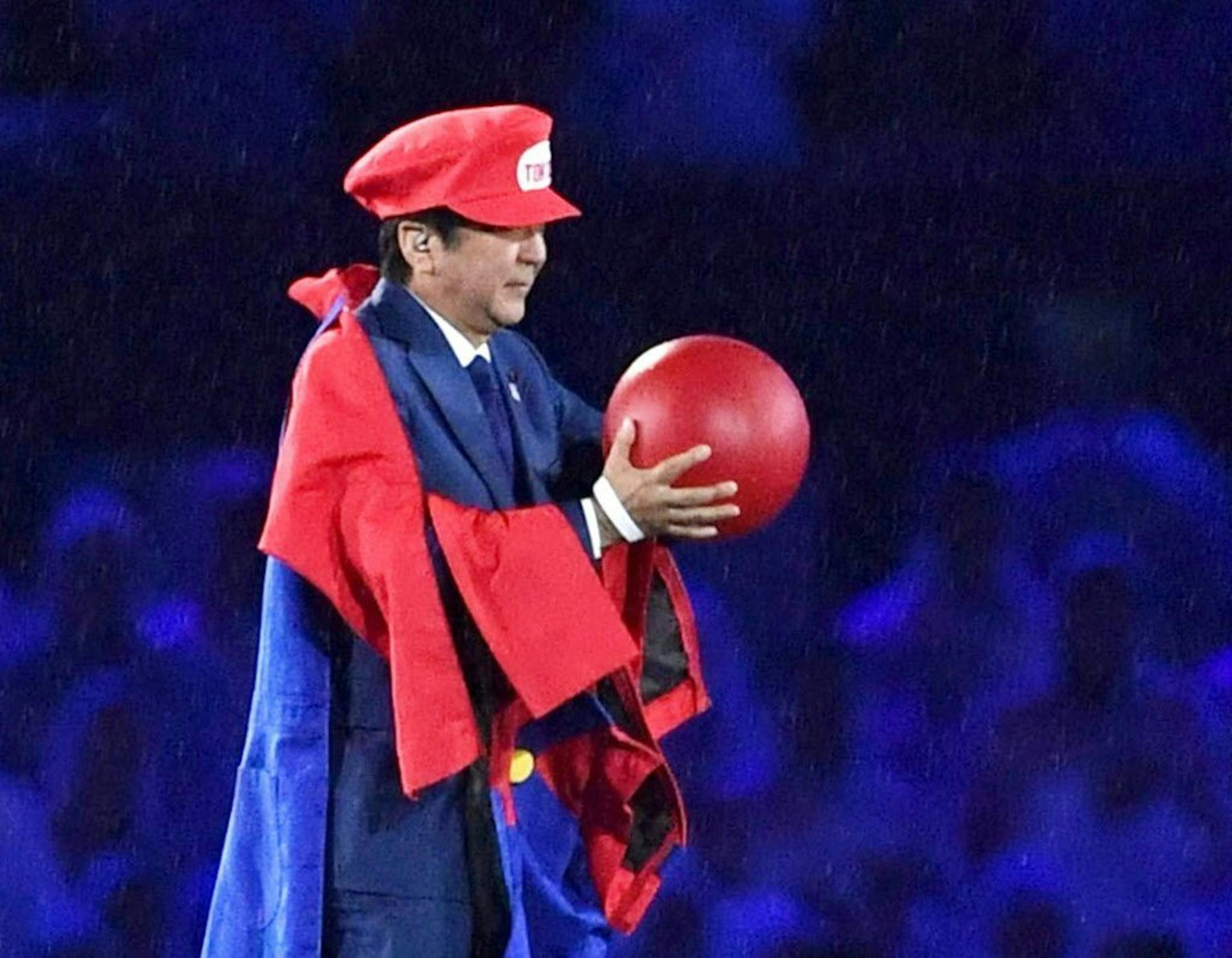Japanese Prime Minister Shinzo Abe appears as the Nintendo game character Super Mario during the closing ceremony at the 2016 Summer Olympics in Rio de Janeiro, Brazil, Sunday, Aug. 21, 2016. Abe's brief but show-stopping appearance as Super Mario offered a tantalizing glimpse at Tokyo's plans for the 2020 games.