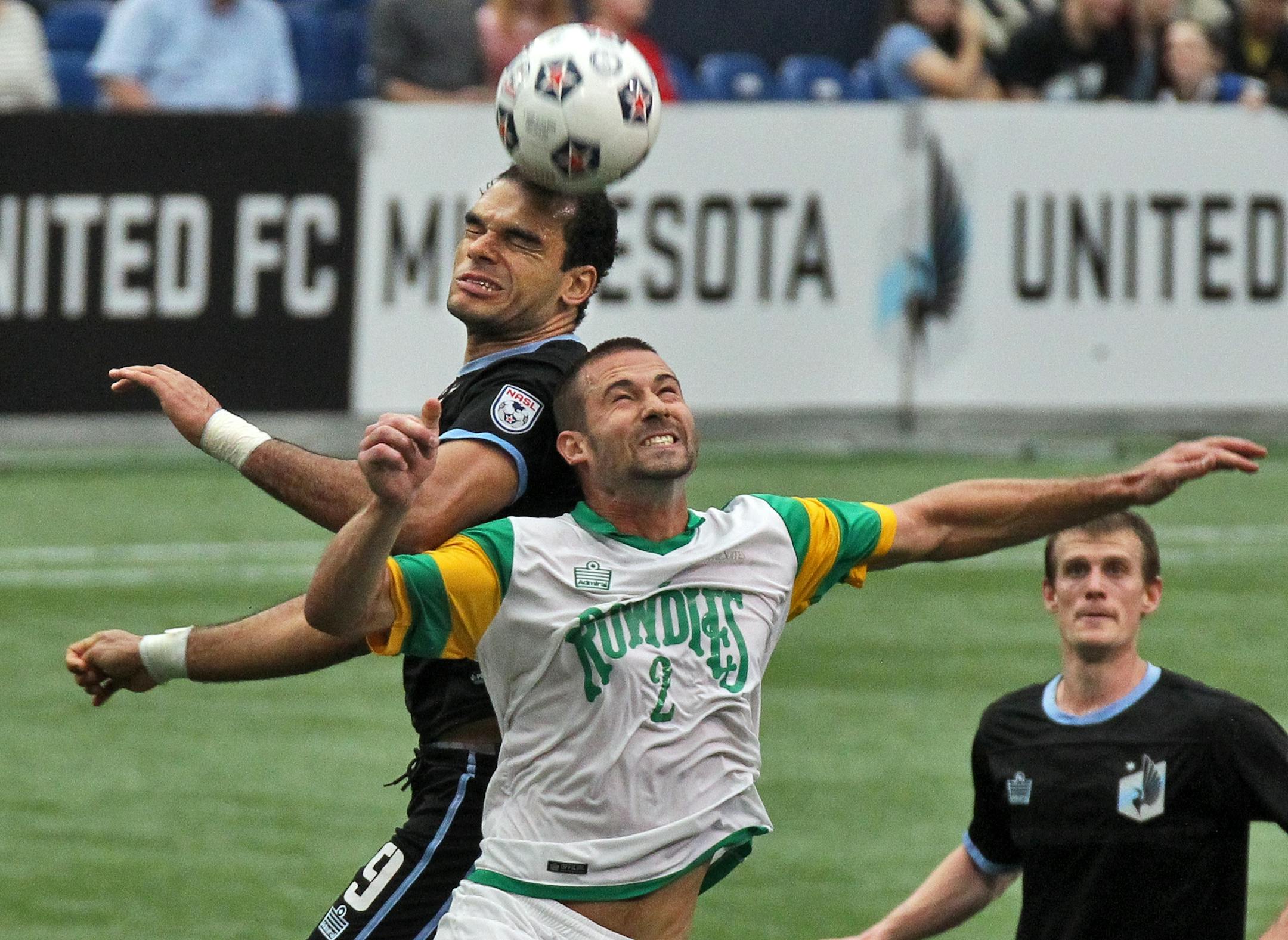 Minnesota United vs. Tampa Bay Rowdies soccer. Rowdies won 3-2. United's Pablo Campos, left, and Rowdies Daniel Scott fought for control of a header. (MARLIN LEVISON/STARTRIBUNE(mlevison@startribune.com