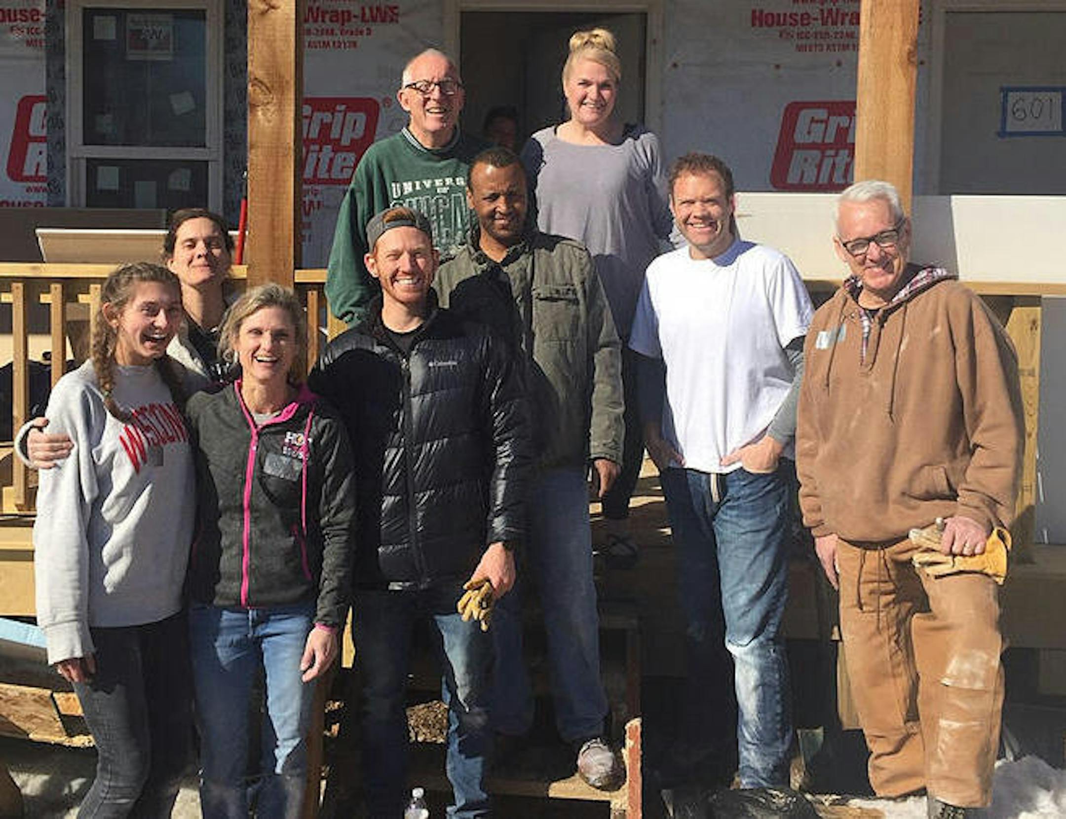 Jim Mulrooney (white T-shirt), worked with family members and friends on a Habitat build.
Courtesy of Mulrooney family