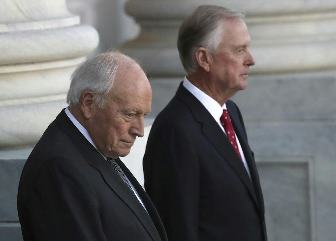 Former Vice President Dick Cheney, left, and and former Vice President Dan Quayle, await the arrival of the procession carrying the casket of former President George H. W. Bush at the Capitol, Monday, Dec. 3, 2018 in Washington.