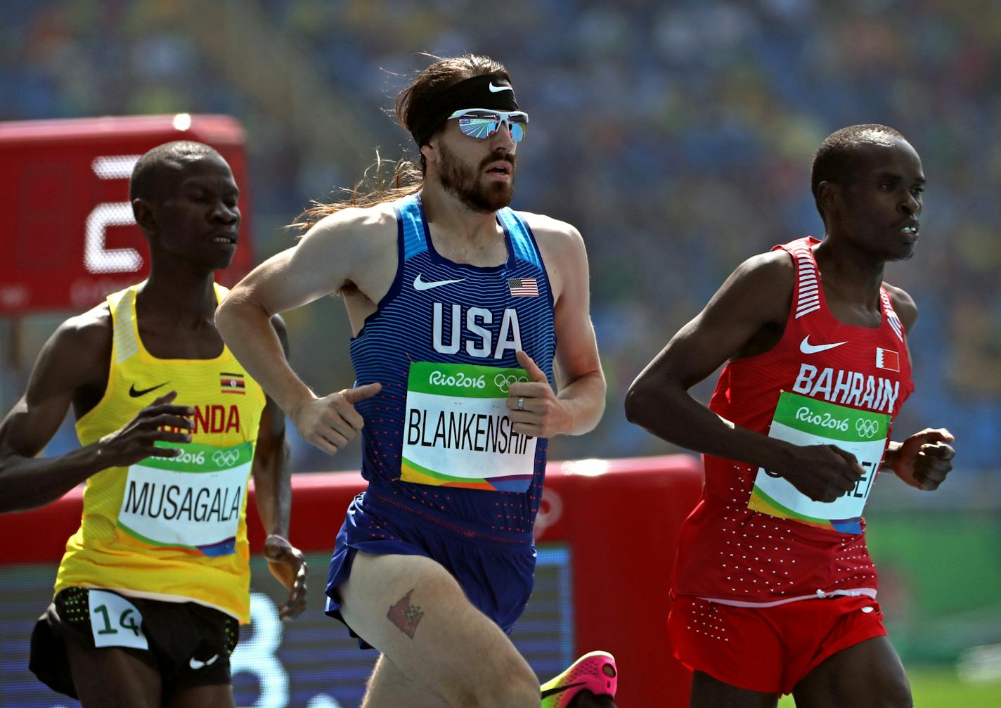 Former gopher Ben Blankenship qualified for the semifinals this morning in the 1500 meters and was looking good doing it. Sporting a Minnesota tattoo on his upper right leg.