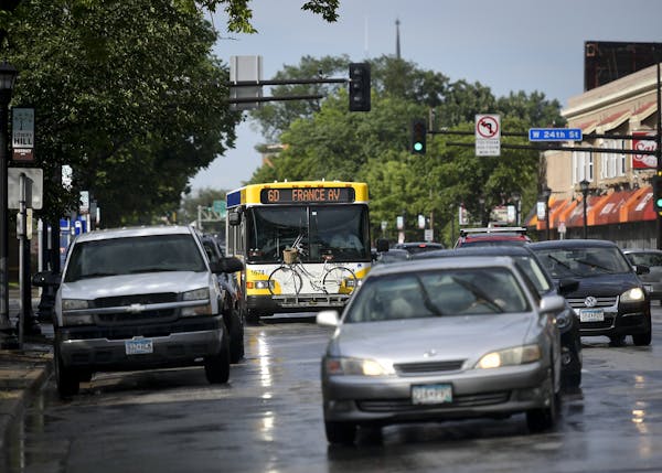 Traffic moved along Hennepin Avenue near W. 24th Street during an evening commute.