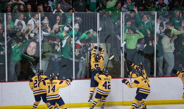 Sophie Stramel (5) skated to Rosemount’s fans to celebrate her winning goal in the second overtime against Cretin-Derham Hall.