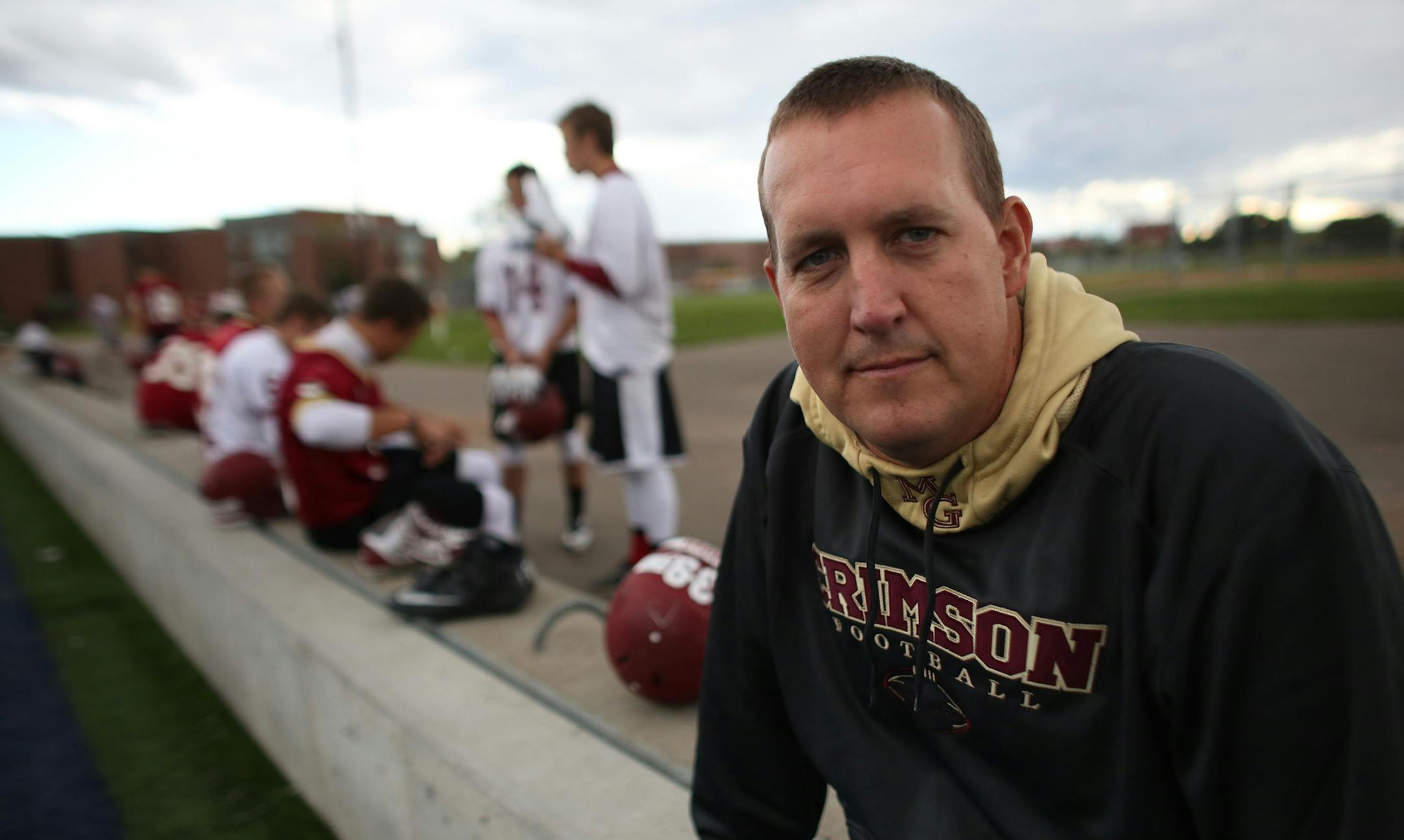 Matt Lombardi is head coach of the Maple Grove High School football team. ] (KYNDELL HARKNESS/STAR TRIBUNE) kyndell.harkness@startribune.com After practice at Maple Grove High School in Maple Grove Min., Thursday, September 11, 2014.