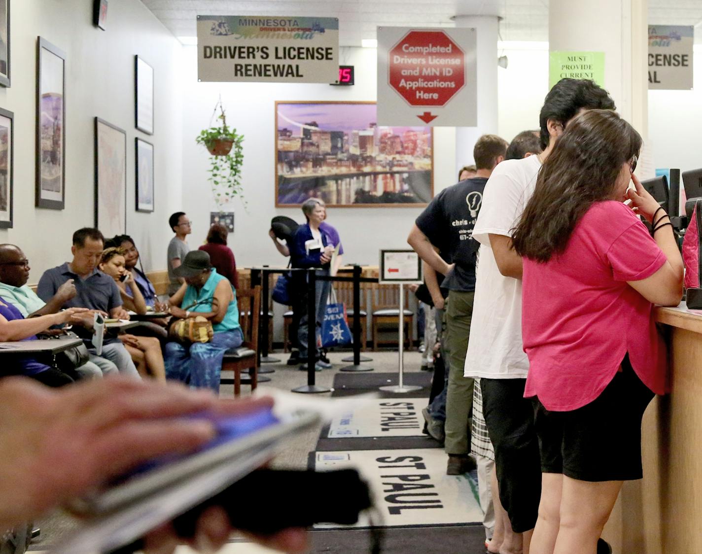 The scene inside the Minnesota DMV office in Sears Thursday, July 6, 2017, in St. Paul, MN.