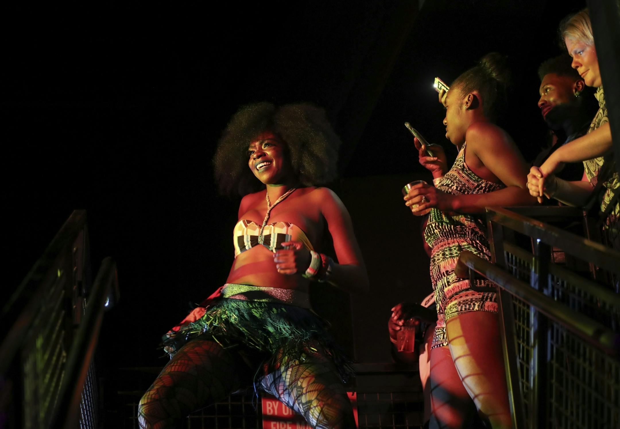 A dancer descended a stairway and made her way to the stage just ahead of Lauryn Hill at First Ave. stage with her band Sunday night.