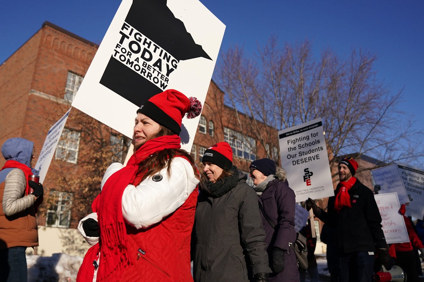 Members of the St. Paul Federation of Educators picketed on Wednesday, Feb. 26, 2020, before school at Adams Spanish Immersion in St. Paul calling for a new contract with the creation of mental health teams in every building.