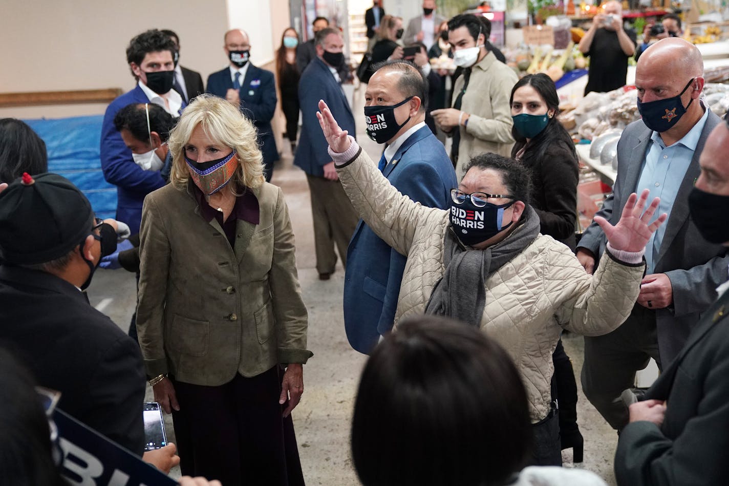 Former Second Lady Jill Biden stood with Hmong community leader Pakou Hang, right, as she talked with community members while touring the Hmong Village Shopping Mall during a campaign stop for her husband democratic presidential nominee Joe Biden Thursday in St. Paul. ] ANTHONY SOUFFLE • anthony.souffle@startribune.com Fromer Second Lady Jill Biden toured the Hmong Village Shopping mall during a campaign stop on behalf of her husband democratic presidential nominee Joe Biden Thursday, Oct. 15, 2