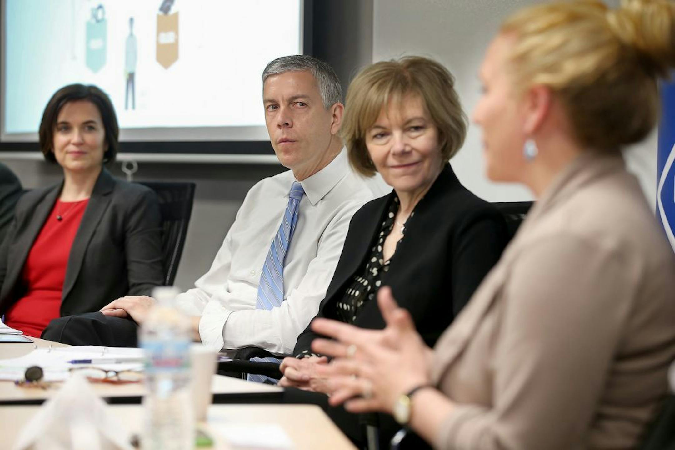 Minneapolis Mayor Betsy Hodges, left, joined United States Education Secretary Arne Duncan and Minnesota Lt. Gov. Tina Smith, right, as they hosted a roundtable discussion with leaders of the Northside Achievement Zone, Tuesday, April 28, 2015 in Minneapolis