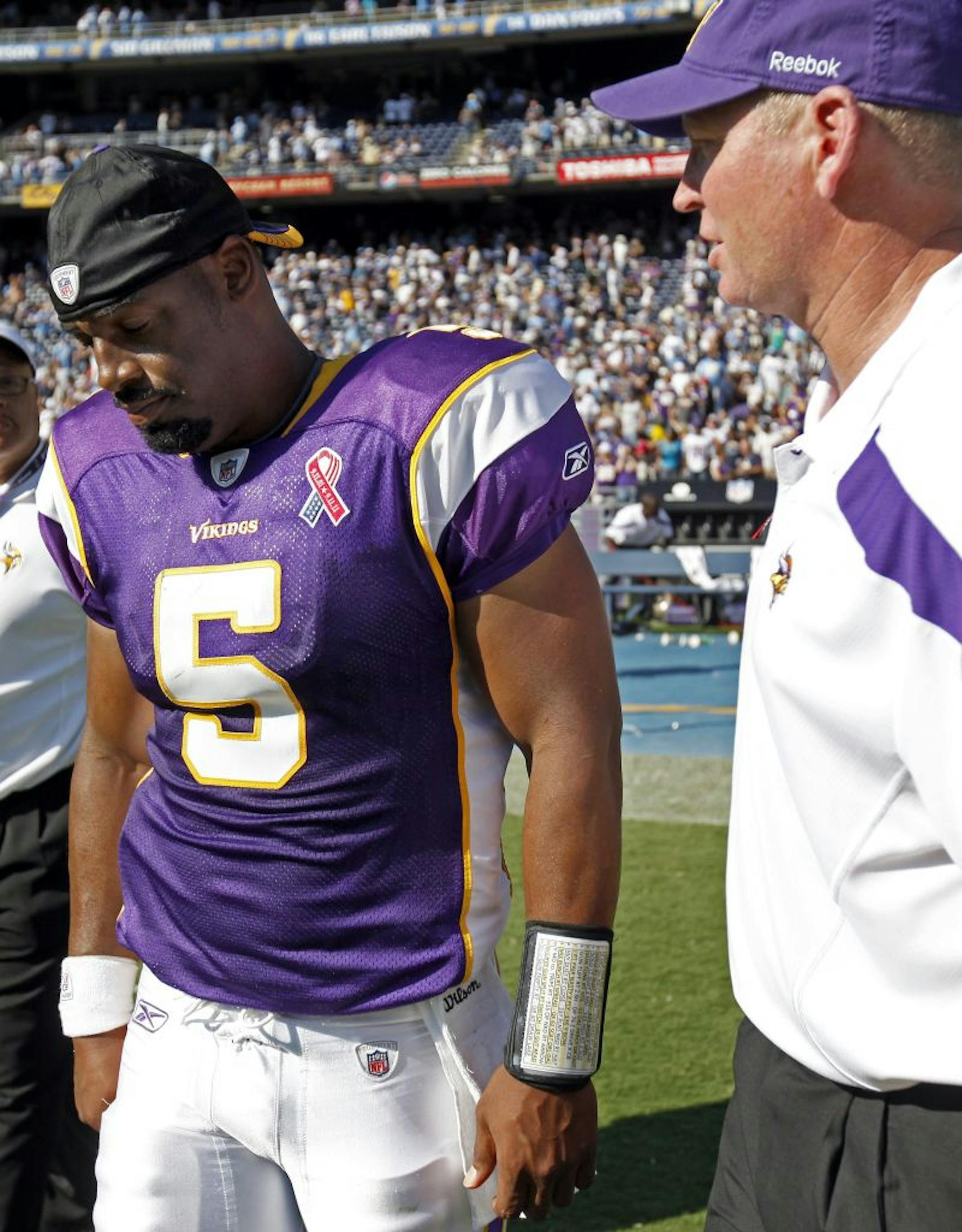 Vikings quarterback Donovan McNabb (left, with offensive coordinator Bill Musgrave)