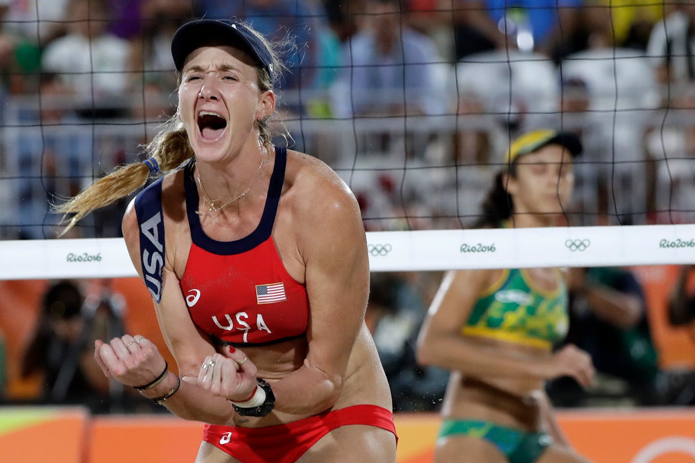 United States' Kerri Walsh Jennings reacts while playing Brazil during the women's beach volleyball bronze medal match of the 2016 Summer Olympics in Rio de Janeiro, Brazil, Wednesday, Aug. 17, 2016. (AP Photo/Marcio Jose Sanchez)