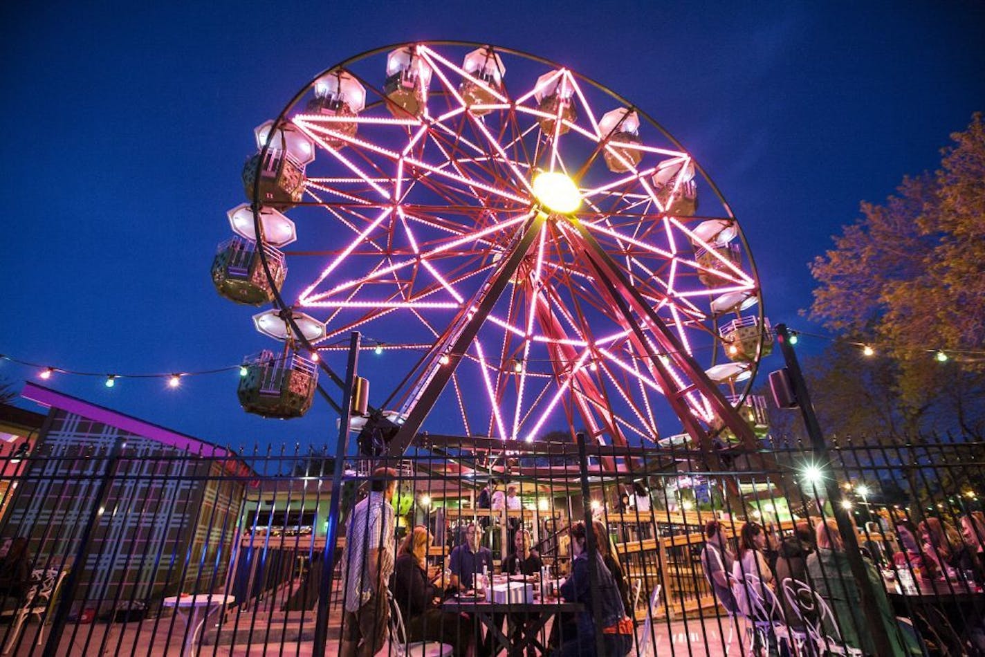 The vertically revolving patio (Ferris wheel) is a popular draw to Betty Danger's Country Club in Minneapolis. The standard Danger Experience on the wheel includes a beverage and a 20-minute rotating experience. Snacks are also available as add-ons. Photographed May 9, 2015.