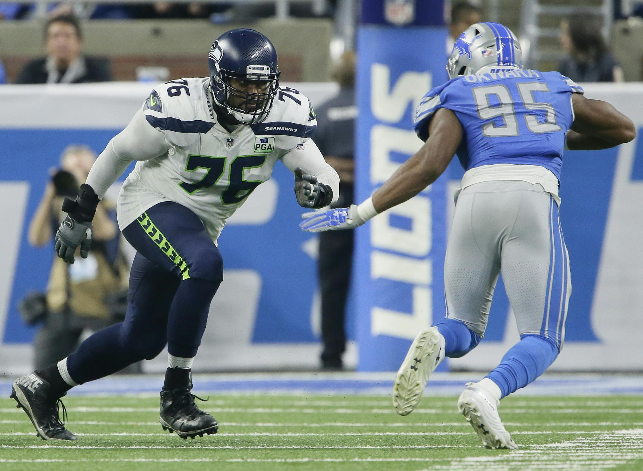 Seattle Seahawks offensive tackle Duane Brown (76) blocks against Detroit Lions defensive end Romeo Okwara (95) during the second half of an NFL football game, Sunday, Oct. 28, 2018, in Detroit. (AP Photo/Duane Burleson)