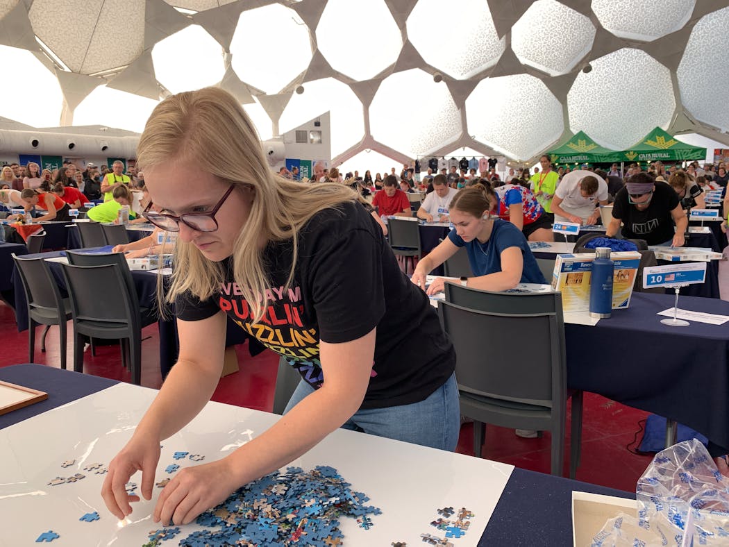 St. Paul resident Sarah Schuler competing at the World Jigsaw Puzzle Championship in Spain.