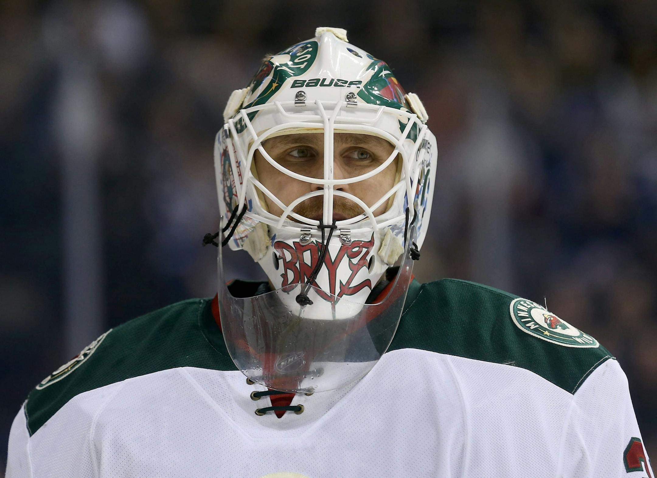 Minnesota Wild's Ilya Bryzgalov (30) takes a breather during a commercial break while playing against the Winnipeg Jets during second period NHL hockey action in Winnipeg, Manitoba, Monday, April 7, 2014.