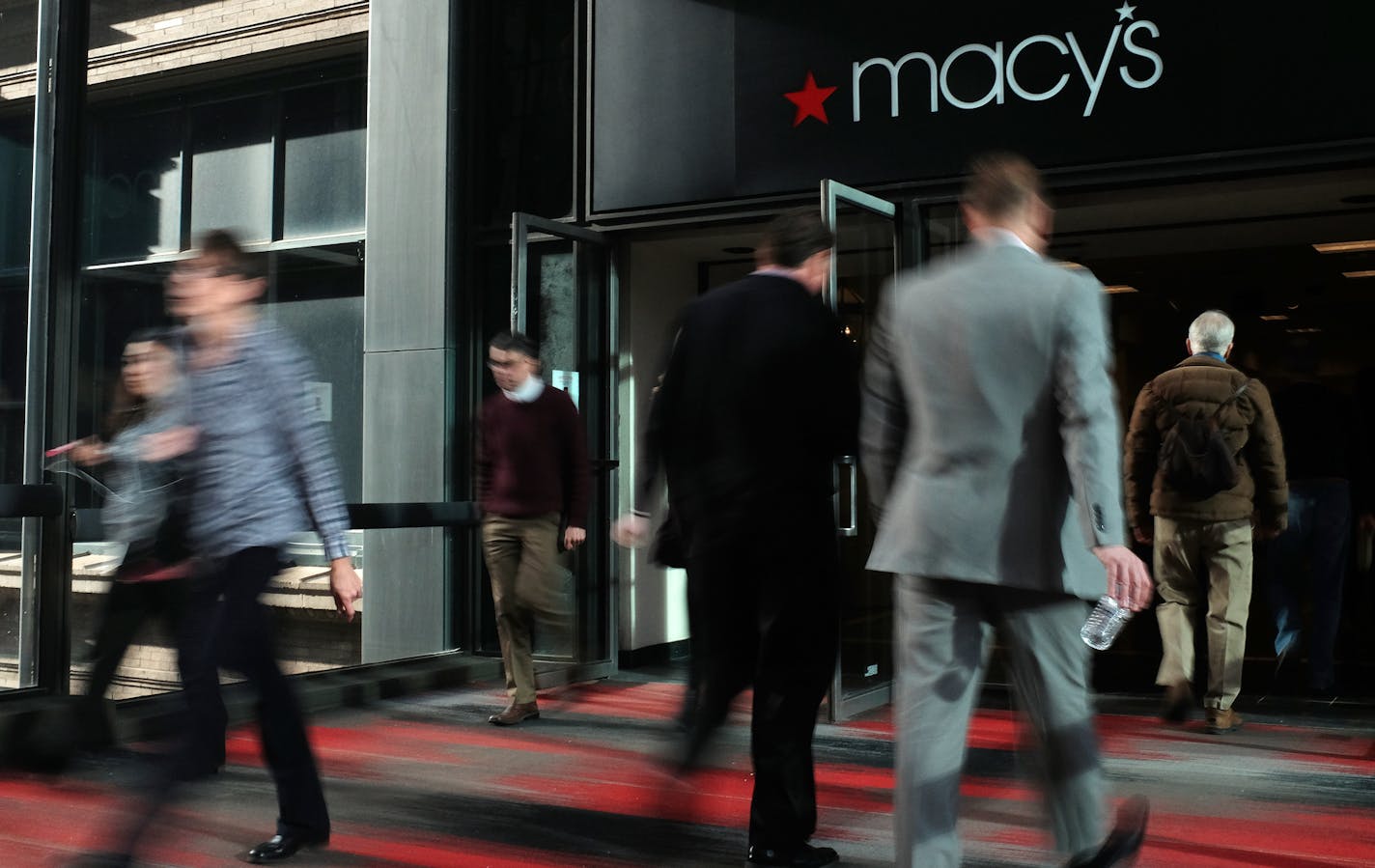 Pedestrians enter and exit Macy&#x2019;s via the skyway Thursday. Macy's is one of the busiest spots in the skyway with an estimated 15,000 trips a day.