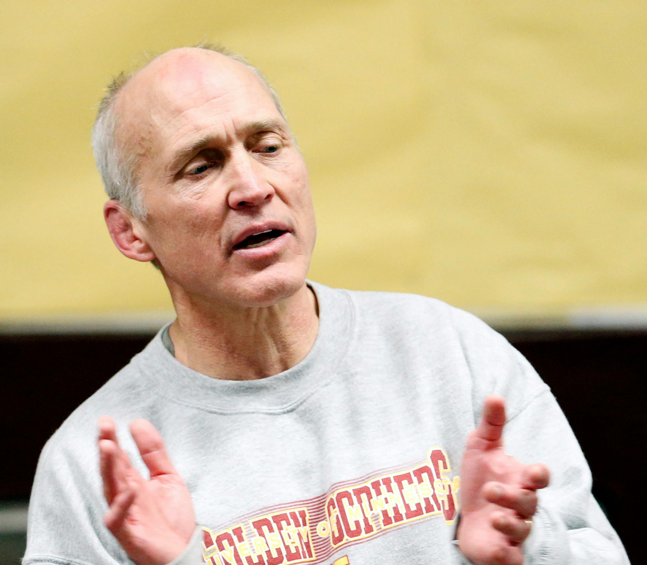 Apple Valley High School wrestling coach Dalen Wasmund during practice on Monday. ] CARLOS GONZALEZ cgonzalez@startribune.com - February 11, 2013, Apple Valley, Minn., Apple Valley High School Wrestling, Profiling Daniel Woiwor and his younger brother, Maolu. ORG XMIT: MIN1302111836321177