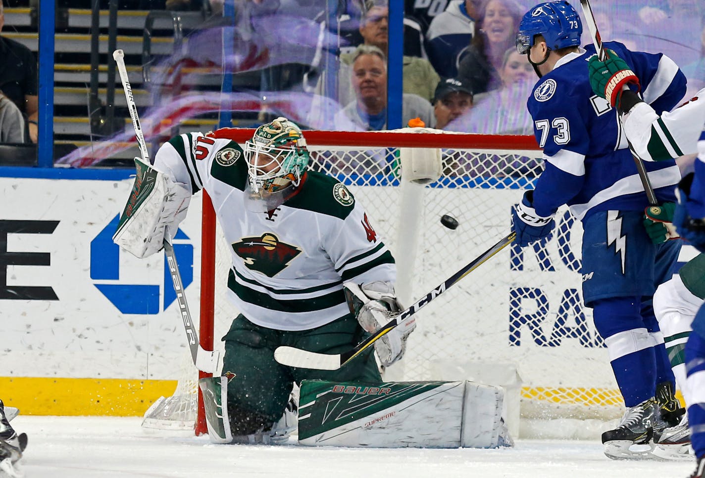 Minnesota Wild goalie Devan Dubnyk allows a goal to Tampa Bay Lightning's Victor Hedman as Adam Erne (73) looks on during the first period of an NHL hockey game Thursday, March 9, 2017, in Tampa, Fla. (AP Photo/Mike Carlson)