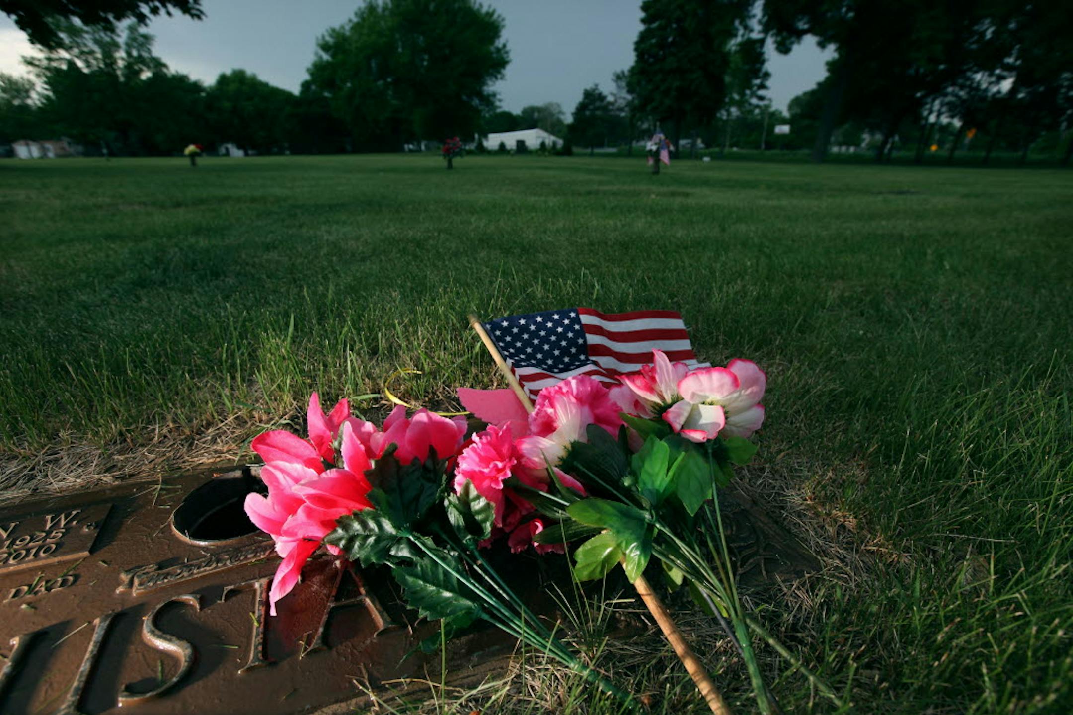 Bronze vases have been stolen from graves (like this one in foreground) at Washburn-McReavy's Glen Haven Memorial Garden.
