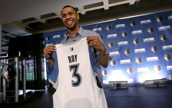 Minnesota Timberwolves' Brandon Roy holds up a jersey after a news conference Tuesday, July 31, 2012, in Minneapolis.