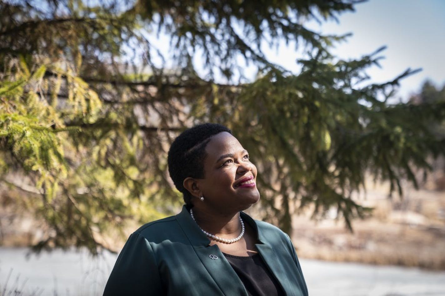 Cindy Kaigama, the health systems director for the Alzheimer's Association of Minnesota and Dakotas, posed for a portrait at Centennial Lakes Park in Edina.