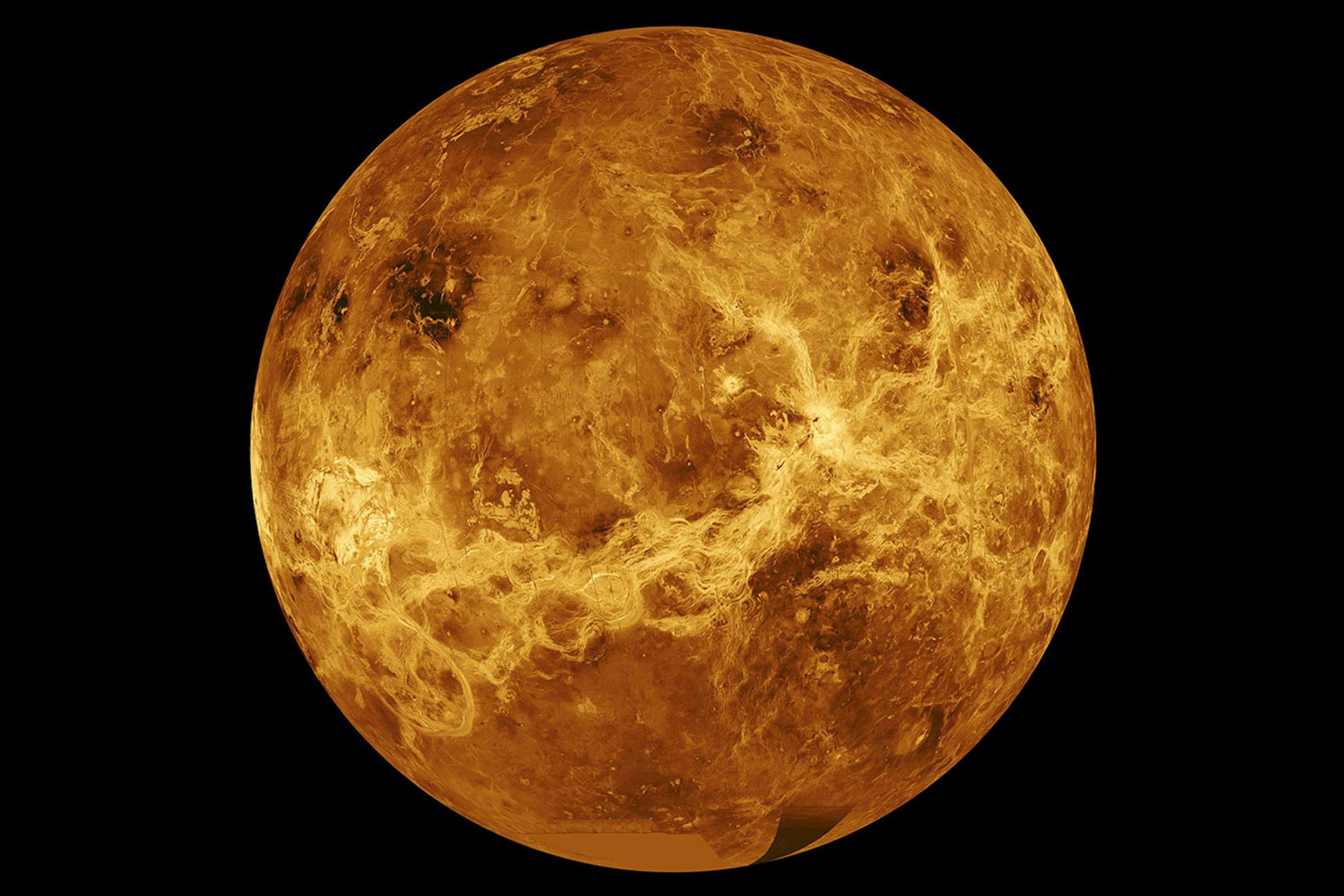 In this file photo made available by NASA shows the planet Venus made with data from the Magellan spacecraft and Pioneer Venus Orbiter. About half an hour before sunrise, Mercury, Venus, Mars, Jupiter and Saturn are aligned in their natural order from the sun stretching in a diagonal starting low in the east.