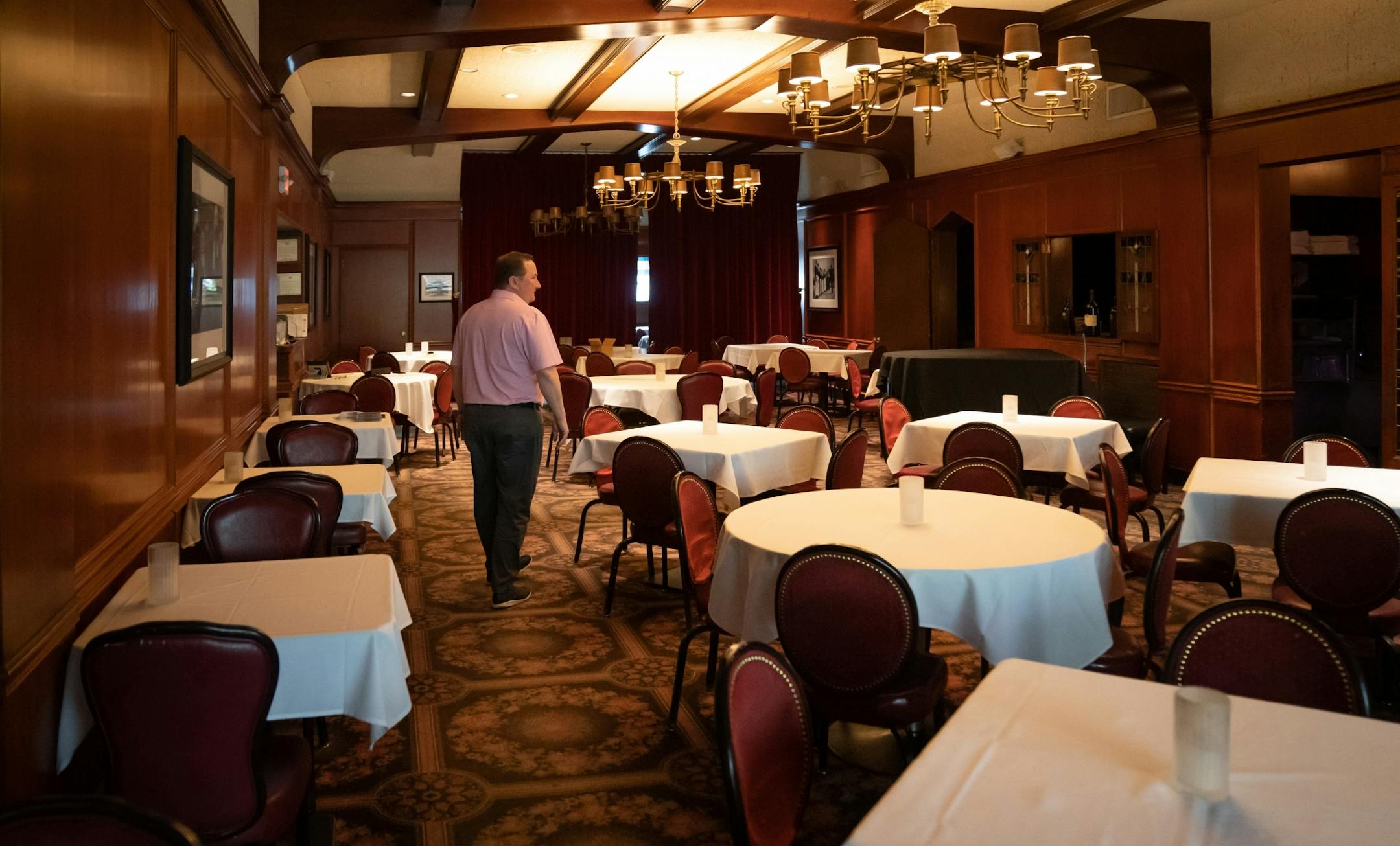 Bill Kozlak, owner of Jax Cafe. This outdoor patio is usually filled with diners. In the early 1950's Jax became the first restaurant to offer outdoor dining. The stream in the outdoor patio is stocked with trout where diners can pick the trout of their choice for dinner.